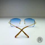 Cartier CT0092o 001 Custom mit Diamanten und Blau Verlauf Selbstabdunkelnd auf Grau (Big C)