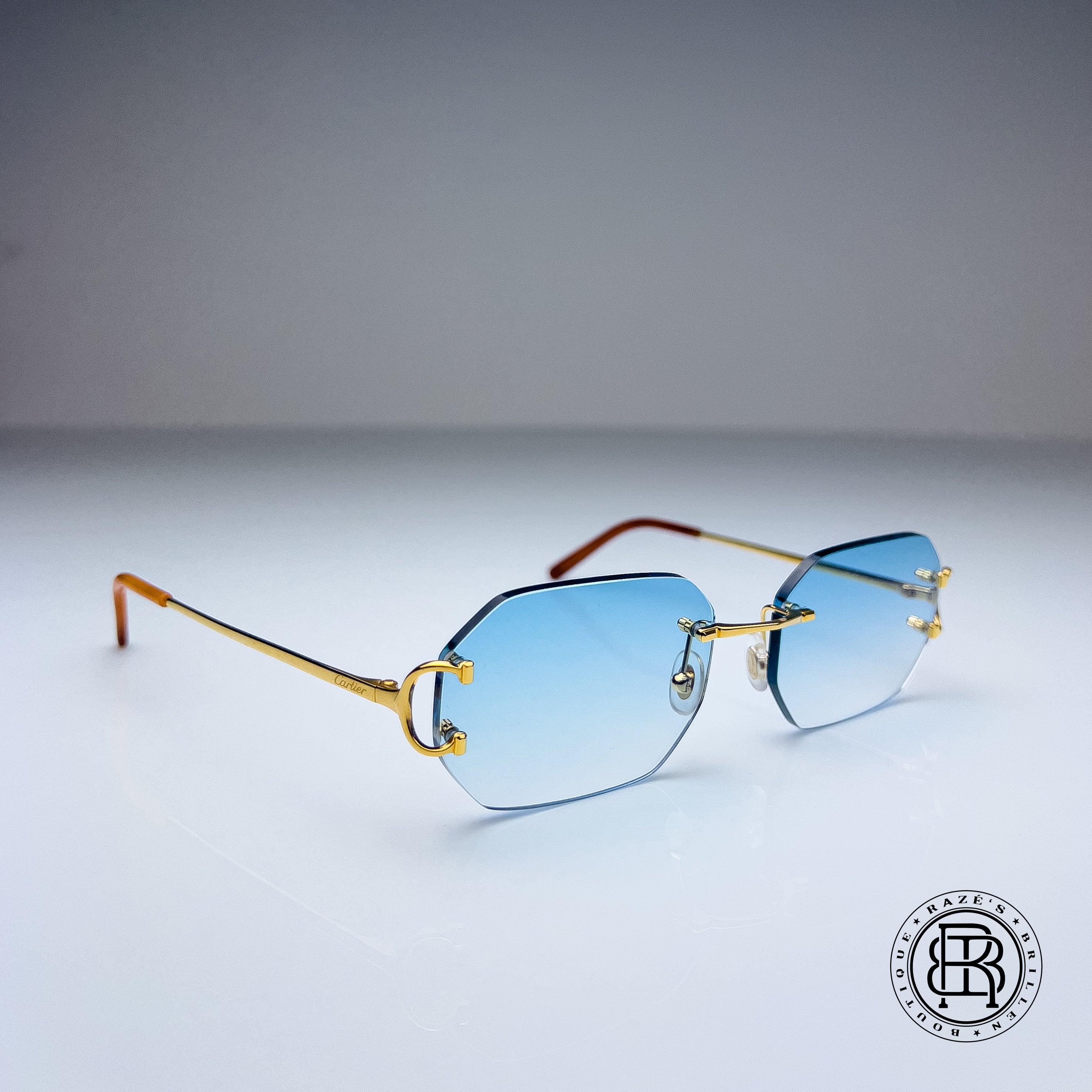 Cartier CT0092o 001 Custom Blau Verlauf selbst abdunkelnd auf Grau Uni (Big C Transitions)